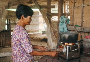 A rural Cambodian household using an Ecozen improved cookstove.